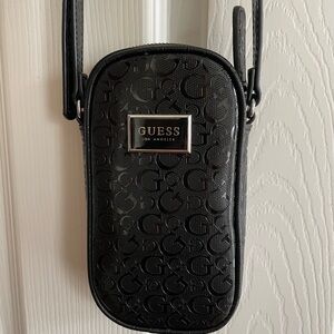 Guess lady’s crossbody bag black almost new condition
